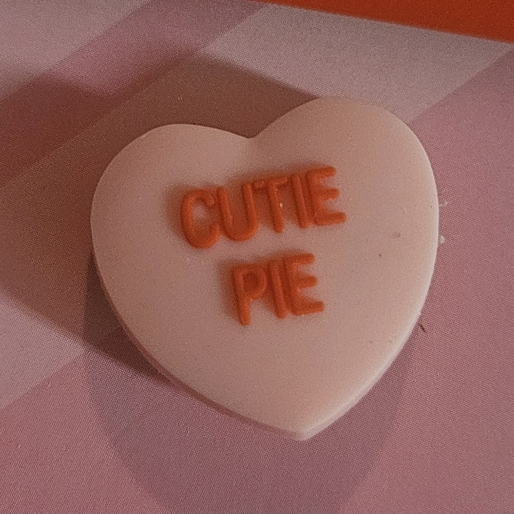 CROCS Pink Heart Jibbitz Charm with Orange "CUTIE PIE" Text